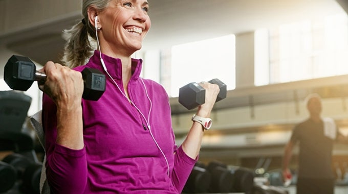 Woman lifting dumbbells