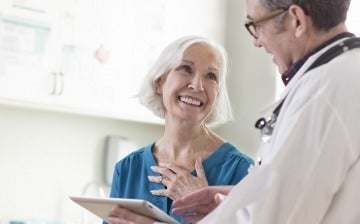 Mature woman consulting with her doctor