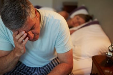 Man having trouble sleeping