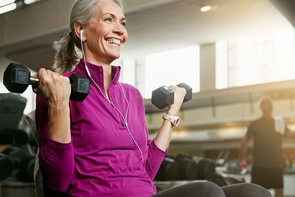 Woman lifting dumbbells