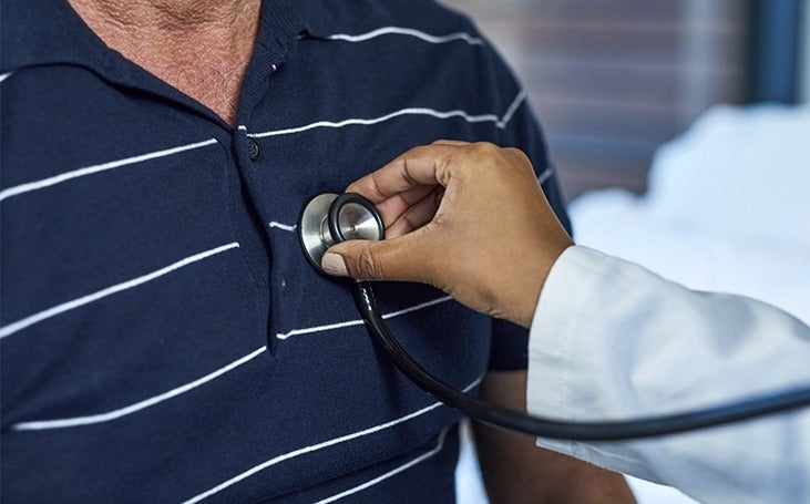 Doctor examining a patient with a stethoscope